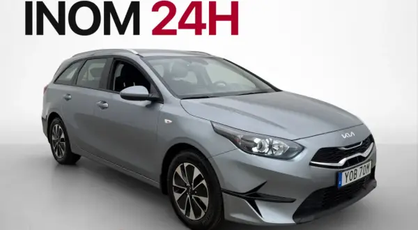 Grå Kia Ceed SW, perfekt för en begagnad bil-test. Hemleverans inom 24h i Sverige.