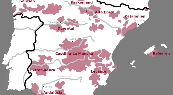 Karte Spaniens mit Anbaugebieten für spanische Rotweinsorten in Regionen wie Rioja, Ribera del Duero und Katalonien.