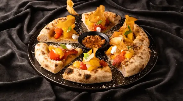 Pizza gourmet co to? Poznaj wyjątkowe smaki i składniki tej pizzy