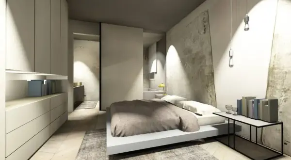 Camera da letto moderna con un elegante bagno in camera. Arredamento minimalista, luci soffuse e un'atmosfera rilassante.