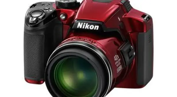 A red Nikon P510 camera with a large lens, ready to capture any adventure.