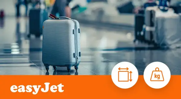 Szara walizka na lotnisku, gotowa na podróż. Sprawdź wymiary i wagę swojego easyJet bagażu rejestrowanego.