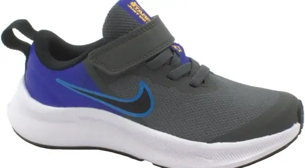 Scarpa Nike grigia con dettagli blu e viola, chiusura a velcro. Perfetta per ogni avventura, che tu sia grande o piccolo.