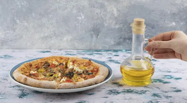 Jaka oliwa do pizzy? Odkryj najlepsze wybory dla smaku pizzy