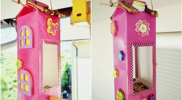 Ein süßes haus aus milchkarton basteln: bunte Blumen, Schmetterlinge und Knöpfe zieren dieses DIY-Vogelhaus.