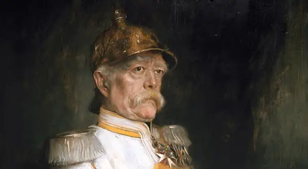 Portret Bismarcka w mundurze wojskowym, z charakterystycznym wąsem i hełmem.