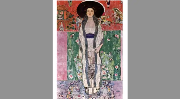 Portrait of Adele Bloch-Bauer II by Gustav Klimt, a woman in a wide-brimmed hat and ornate dress stands against a vibrant, patterned background.