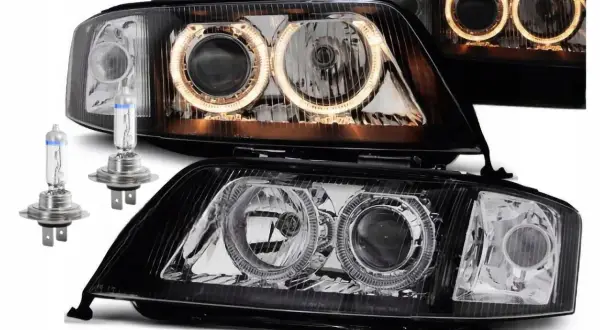Nowe lampy do Audi A6 C5 z ringami i żarówkami.