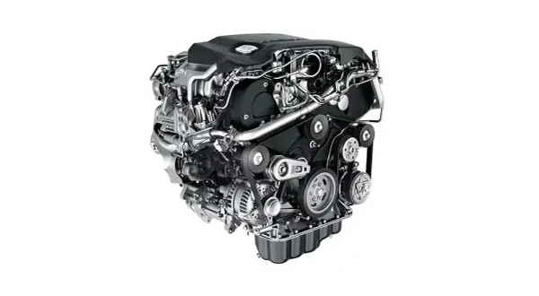 En modern euro 6 dieselmotor med synliga remmar, generator och insugsrör.