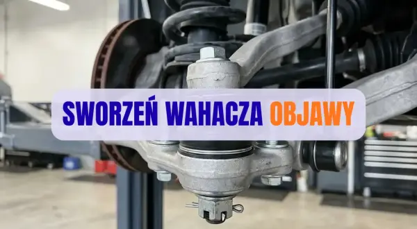 Widok na zawieszenie samochodu z widocznym sworzniem wahacza. Napis na obrazku: "SWORZEŃ WAHACZA OBJAWY".