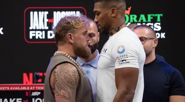 Two boxers face off, highlighting how boxing weight classes work to ensure fair competition.