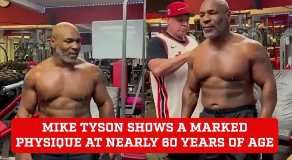 Mike Tyson's impressive physique at nearly 60 years old is on full display in a gym setting. His muscular build shows his continued dedication to fitness.
