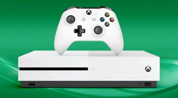 Biały kontroler Xbox i konsola Xbox One na zielonym tle.