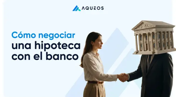 Una mujer estrecha la mano a una figura con un banco en la cabeza. El texto dice "Cómo negociar una hipoteca con el banco".