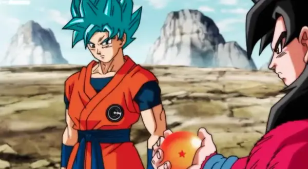 Goku, dragon ball hero, z niebieskimi włosami i w pomarańczowym gi, otrzymuje Smoczą Kulę.