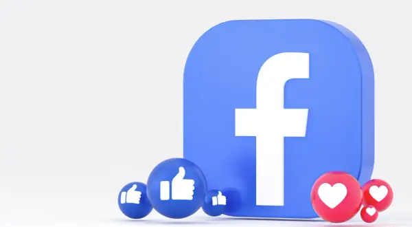 Ikona Facebooka z kciukami w górę i serduszkami. Dowiedz się, jak utworzyć wydarzenie na FB, aby promować swoje spotkania.