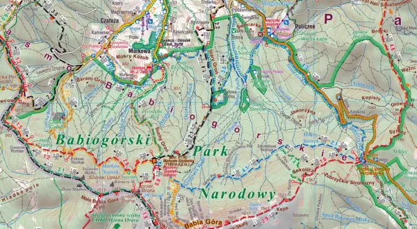 Mapa turystyczna **Beskidu Żywieckiego** z zaznaczonymi szlakami, szczytami i obiektami.
