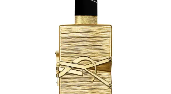 Złoty flakon perfum Libre 100ml z czarną nakrętką i złotym logo YSL.