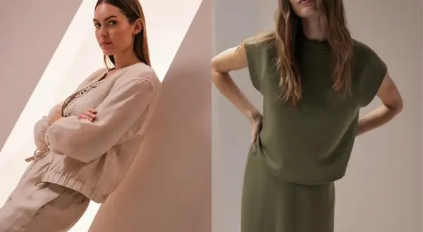 Zwei Frauen in stilvollen, **monochromen Outfits**: eine in Beige mit Leinenjacke und Hose, die andere in Khaki mit Oberteil und Rock.