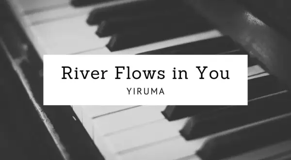 Nuty Yirumy "River Flows in You" na tle klawiatury fortepianu. Melodia płynie jak rzeka.