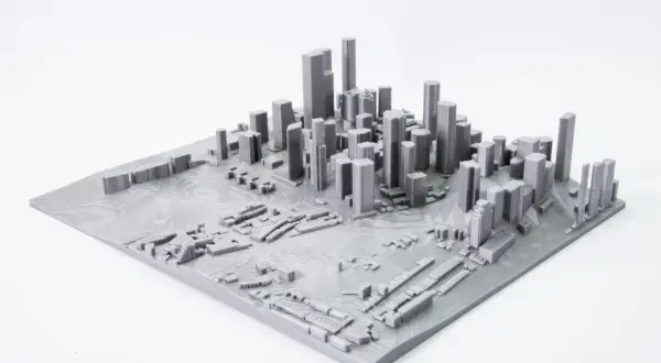 Model miasta z wieżowcami i niską zabudową, stworzony przez mapping 3d.