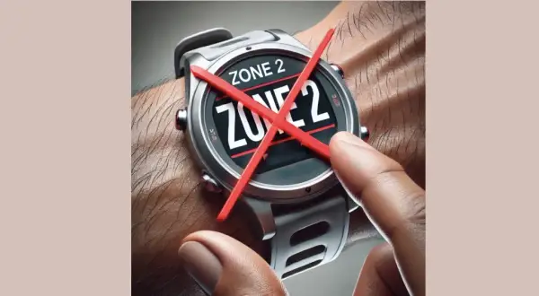 Montre connectée affichant "ZONE 2" barré de rouge. Fin de l'entraînement en zone 2.