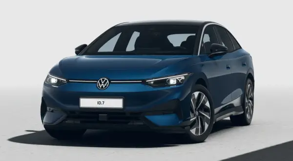 Elegancki, ciemnoniebieski VW ID.7 z czarnym dachem prezentuje się nowocześnie.