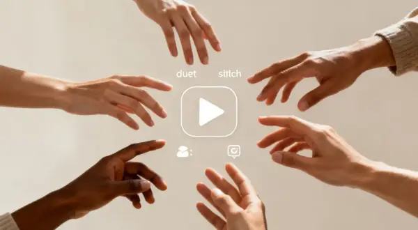 Hands reach for a play button, symbolizing collaboration and the creation of a social media viral video through duet and stitch features.