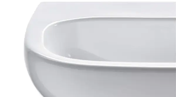 Biała, ceramiczna wanna Duravit D-Code o gładkich, zaokrąglonych krawędziach, zapraszająca do relaksu.