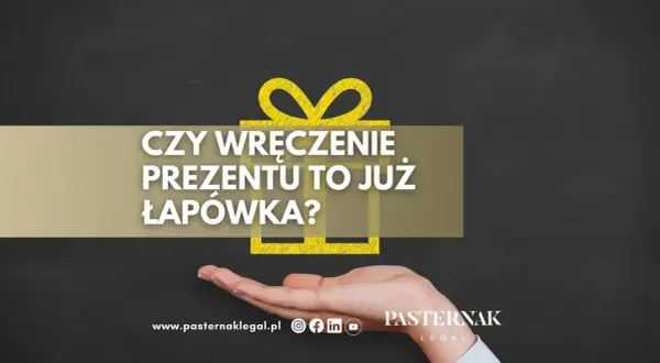 Czy wręczenie prezentu to już łapówka? Dłoń trzyma symbol prezentu, a tekst pyta o granicę między gestem a nielegalnym działaniem.