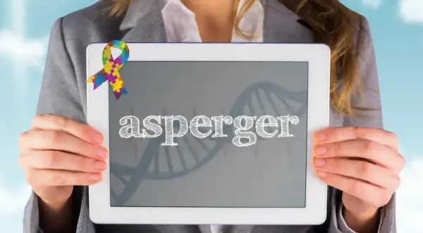 Kolorowa wstążka symbolizuje świadomość aspergera. Na ekranie tabletu widnieje napis "asperger" i schemat DNA.