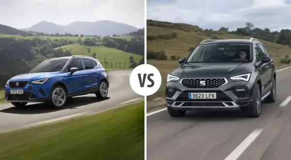 Niebieski i szary Seat SUV jadące po krętych drogach.