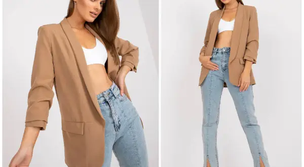 Modelka w beżowej marynarce i białym topie, prezentująca stylizację co pod marynarkę damską.