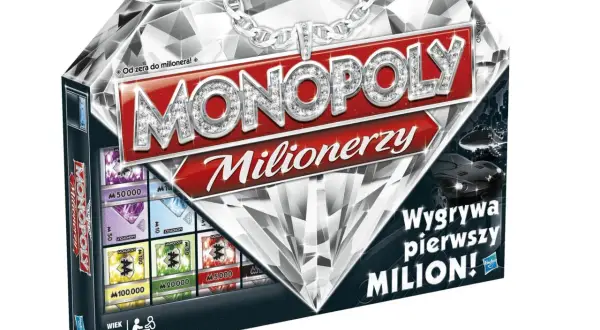 Pudełko gry Monopoly Milionerzy z diamentowym wzorem i ikonami pieniędzy.