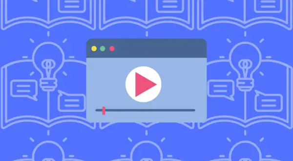 Otwarta książka z żarówką i dymkami dialogowymi. Obok odtwarzacz wideo. To idealny motyw, o czym można napisać opowiadanie.