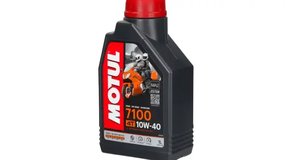 Czarna butelka oleju Motul 7100 10W-40 z czerwoną zakrętką i grafiką motocykla.