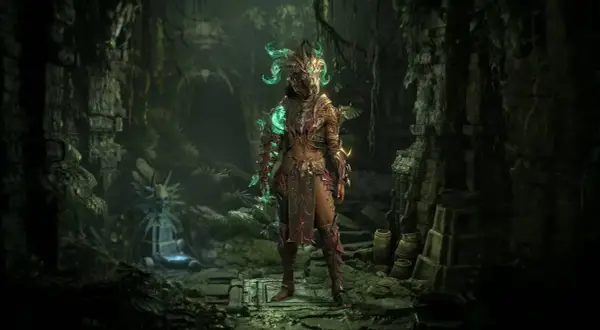 Postacie z Diablo 4 w zbroi z zielonymi, świecącymi elementami, stojące w ruinach świątyni.