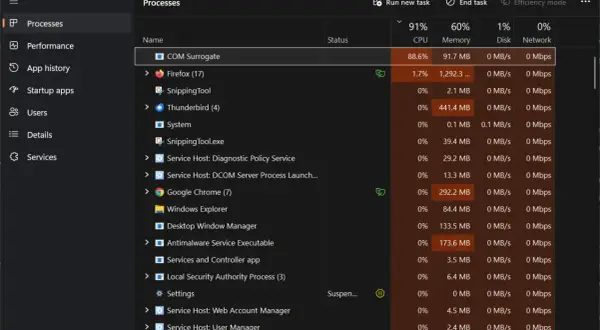 COM Surrogate zużywa 88.6% CPU. W Menedżerze zadań widać proces COM Surrogate z wysokim obciążeniem procesora.