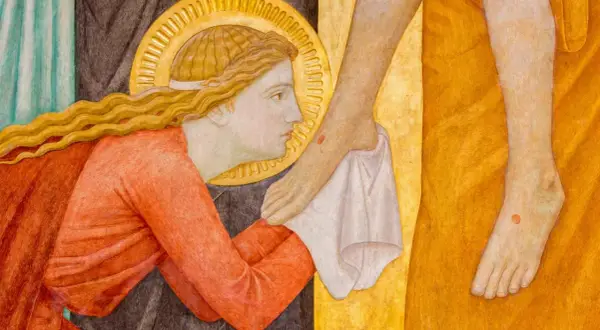 Maria aus Magdala, mit goldenem Heiligenschein, wäscht die Füße Jesu mit ihren Haaren.
