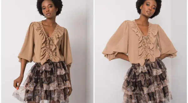 Modelka w bluzce z falbankami i koronką oraz zwiewnej spódnicy z falbanami w stylu boho.
