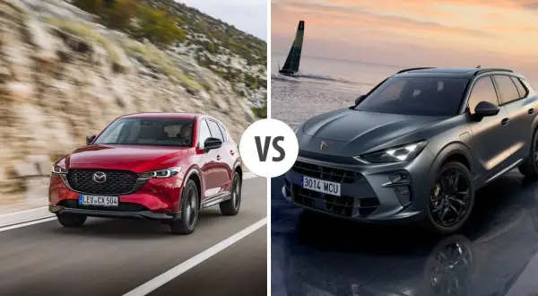Czerwona Mazda CX jedzie po górskiej drodze, a szary SUV stoi nad wodą.