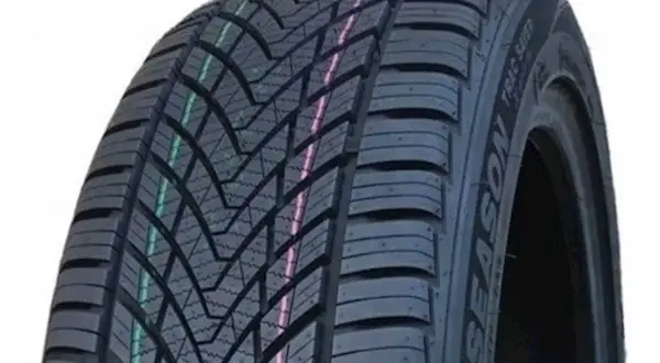 Opony Tracmax opinie: bieżnik całoroczny z zielonym i różowym oznaczeniem.