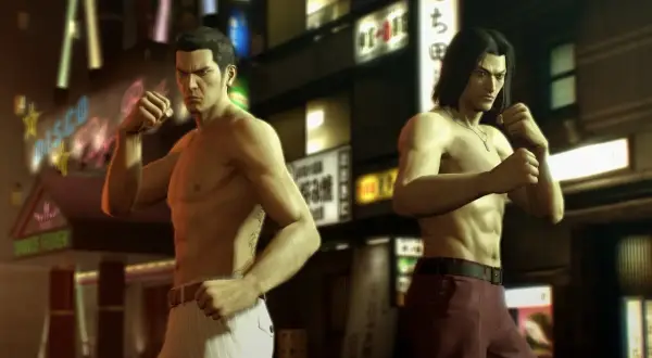 Dwóch mężczyzn w pozycji bojowej na tle neonów. Kiryu i Nishikiyama gotowi do walki w Yakuza 0 spolszczenie.