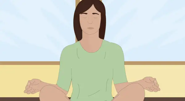 Persona meditando en posición de loto, con los ojos cerrados y las manos en mudra, buscando conectar con el yo superior.