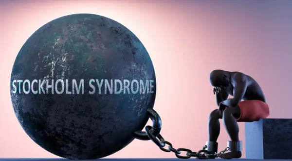 Syndrom sztokholmski: Dlaczego ofiara broni kata? Poznaj mechanizm.