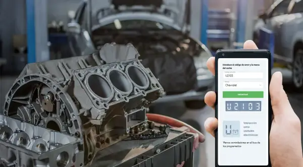 Mecánico usa app para diagnosticar código U2103 en motor de Chevrolet.