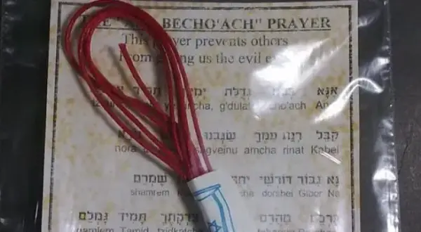 Czy czerwona nitka to grzech? Odkryj prawdę o jej znaczeniu