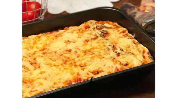 Jak zrobić, żeby ciasto na pizzę było miękkie i puszyste?