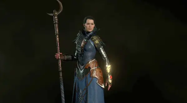 Czarodziejka z Diablo 2, gotowa do walki z potężnym kosturem. Jej strój sugeruje potężny diablo 2 czarodziejka build.