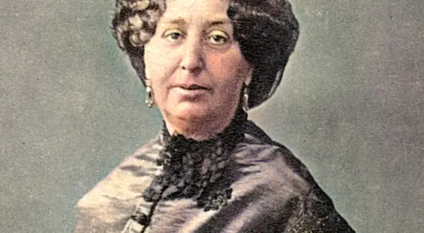 Portret George Sand, francuskiej pisarki, w eleganckiej sukni z koronkowym kołnierzem.